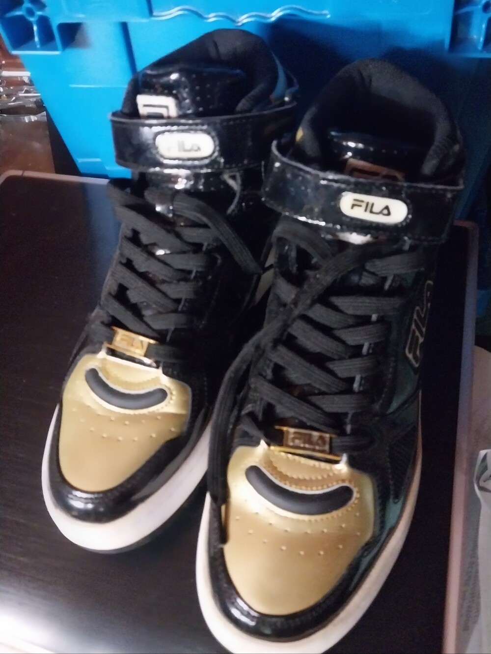FILA Men’s High-Top Sneakers in Black and Gold